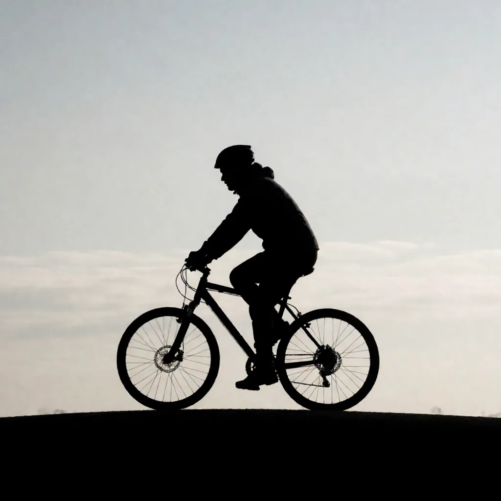 Cyclist on a ridge